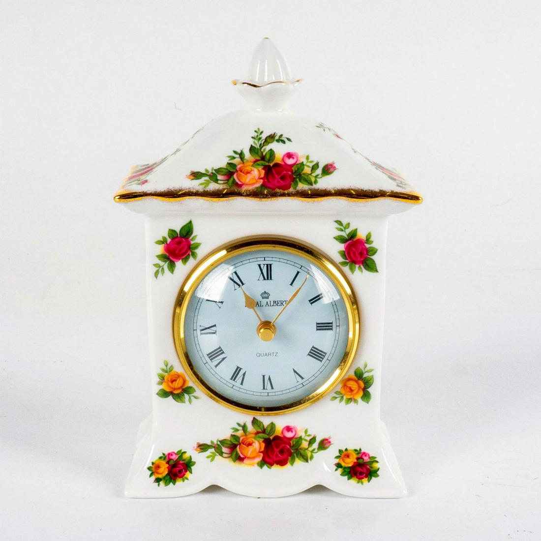 Royal Albert, Country Roses Clock: Featuring roman numerals, with Royal Albert backstamp on base. Untested. #RoyalAlbert #Collectible Issued: 20th c. Dimensions: 4"L x 6.5"H Manufacturer: Royal Albert Country of Origin: England