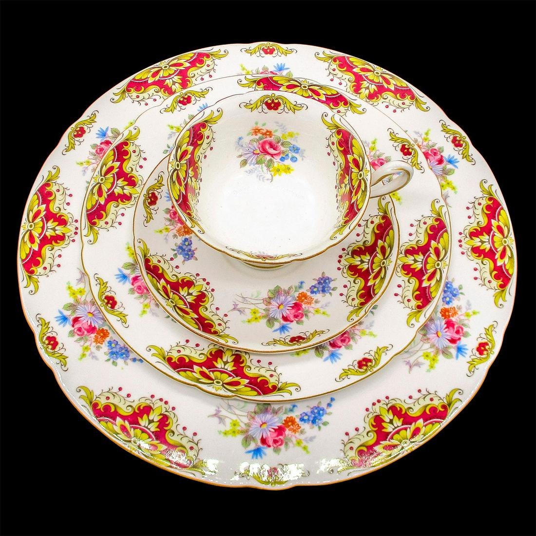 4pc Shelley England Tea Set, Pattern 2518: Florals center, maroon with tan scroll design; tan rim. Gainsborough shape. Fine Bone China Shelley England backstamp on all. Cup 2.5"H. Saucer 5.75"W. Salad plate 8"W. Dinner plate 11"