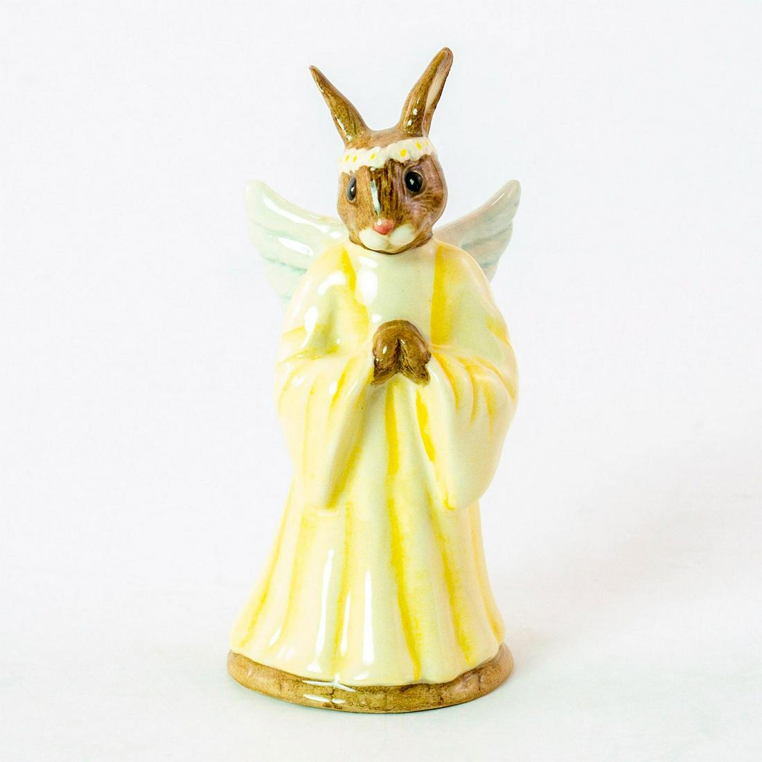 Angel DB196 - Royal Doulton Bunnykins: Yellow and white coloration. Royal Doulton backstamp. Weight: 2.4 oz Artist: C. Dadd Issued: 1999 - 2001 Dimensions: 4"H Country of Origin: England Manufacturer: Royal Doulton