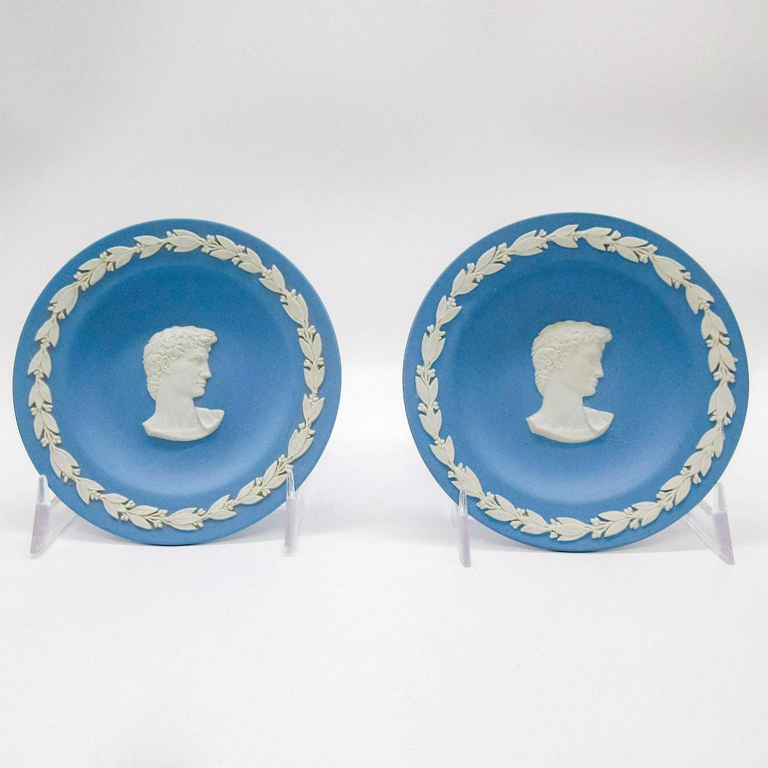Pair Of Wedgwood Pale Blue Jasperware Plates, Caesar: Two stoneware pale blue plates with cream sprigs displaying a portrait of Caesar in relief. Rims are decorated with laurel design. Impressed Wedgwood backstamp. #wedgwood #jasperware #neoclassical Iss