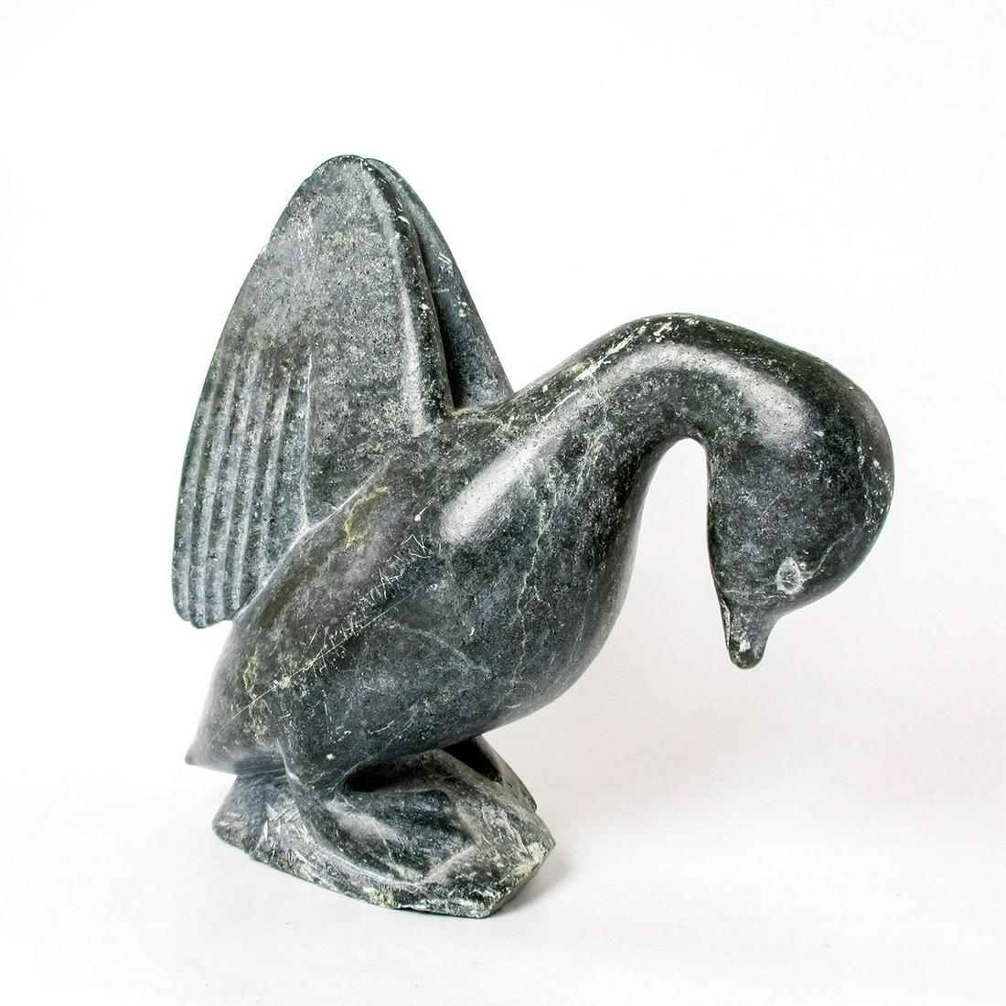 Eli Elijassiapik (b.1936) Inuit Soapstone Sculpture: Artist information tag on base. Bird indigenous art sculpture; hand-carved light grey stone. Port Harrison, PQ carver - Eli / Post no. 1609 on base. Elijassiapikï¿½s carvings from the l