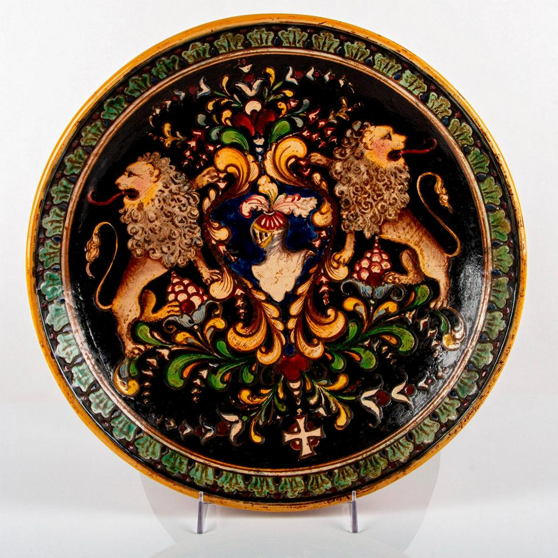 Vintage Hand-painted Heraldry Decorative Plate: Art ceramic plate with relief of lions and knight armor heraldry design. Foliate pattern encircling rim. No marking. #heraldry Issued: 20th c. Dimensions: 2.75"H x 15.5" dia.