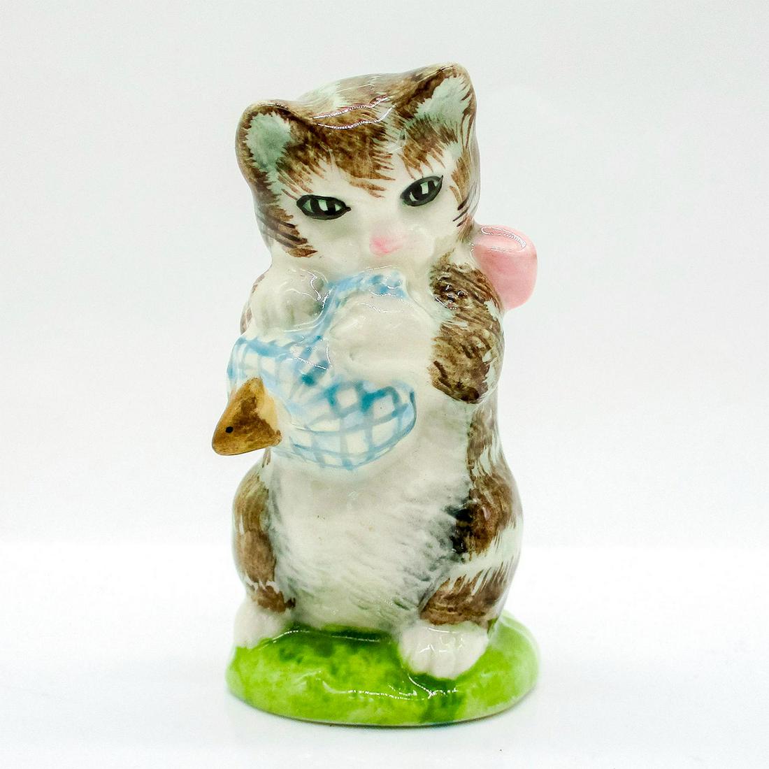 Miss Moppet - Royal Albert - Beatrix Potter Figurine: Porcelain glazed figure of Miss Moppet, a striped brown cat holding a blue checkered kerchief. Royal Albert backstamp. Artist: Arthur Gredington Issued: 1989 Dimensions: 3"H Manufacturer: Royal Albert