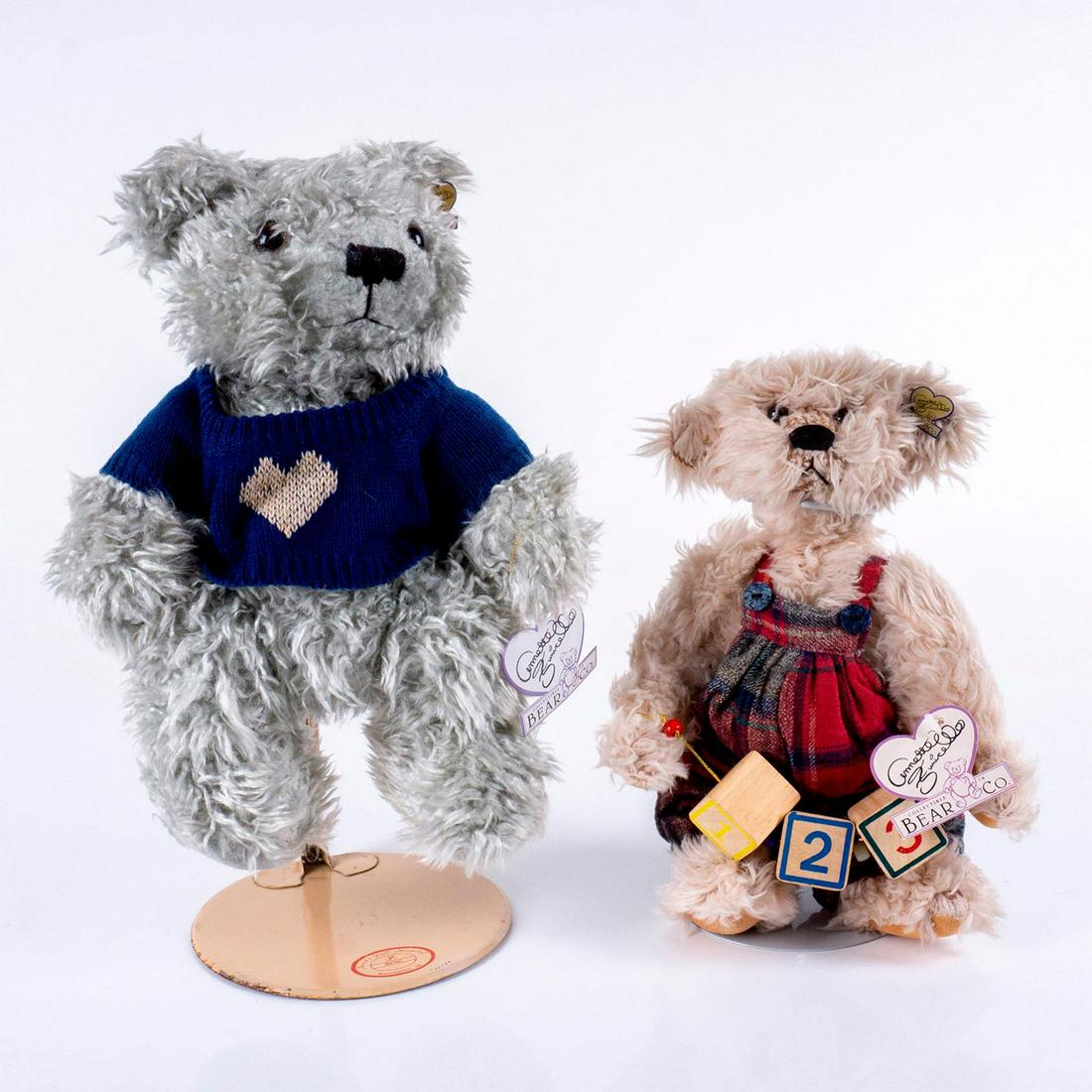 2pc Annette Funicello Collectible Bear Company Teddy Bears: Shaggy friends duo. First bear wears sweater decorated with heart and has approximate height of 12". Second bear has approximate height of 10" and wears plaid overalls and holds number blocks. #Annett