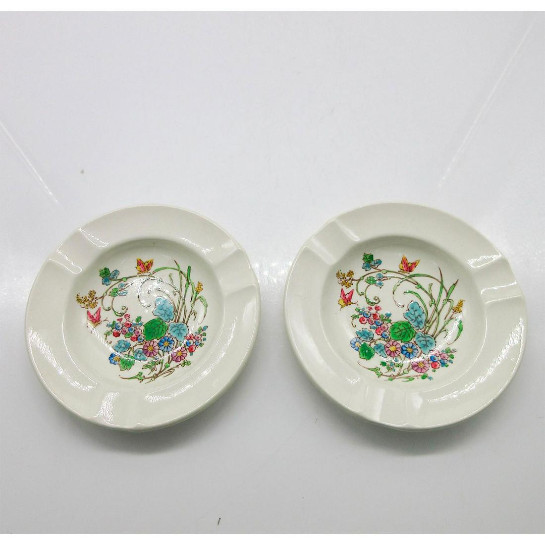 2 Wedgwood Etruria Barlaston Porcelain Floral Ashtrays: Pair of Vintage multicolor ashtrays depicting flowers and birds. Wedgwood backstamp. #Ashtray #Ceramics #England #Birds #Flowers Issued: 20th c. Dimensions: 4.5" dia. Manufacturer: Wedgwood Country of
