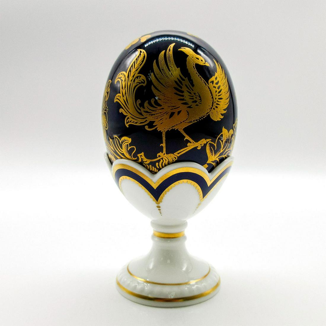 Royal Crown Derby Porcelain Old Imari Egg With Stand: Fine bone china with 22k gilding in cobalt blue and white. Royal Crown Derby backstamp and edition number. #Egg #England #Porcelain Issued: 1998 Dimensions: 5.5"H Edition Number: 1138 of 3500 Manufact