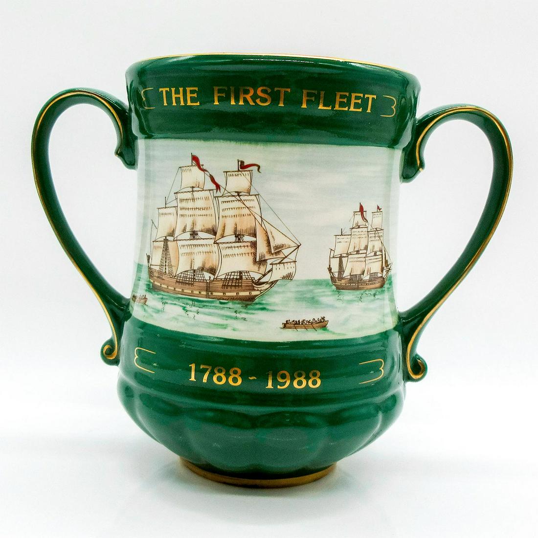 Royal Doulton Australian Bicentennial Loving Cup: Limited edition 277 of 350. Feathering the first fleet and Sydney opera house. Gilt accents. Royal Doulton backstamp. Australia - Past to Present stamped on base. #Australia Issued: 1988 Dimensions: 7