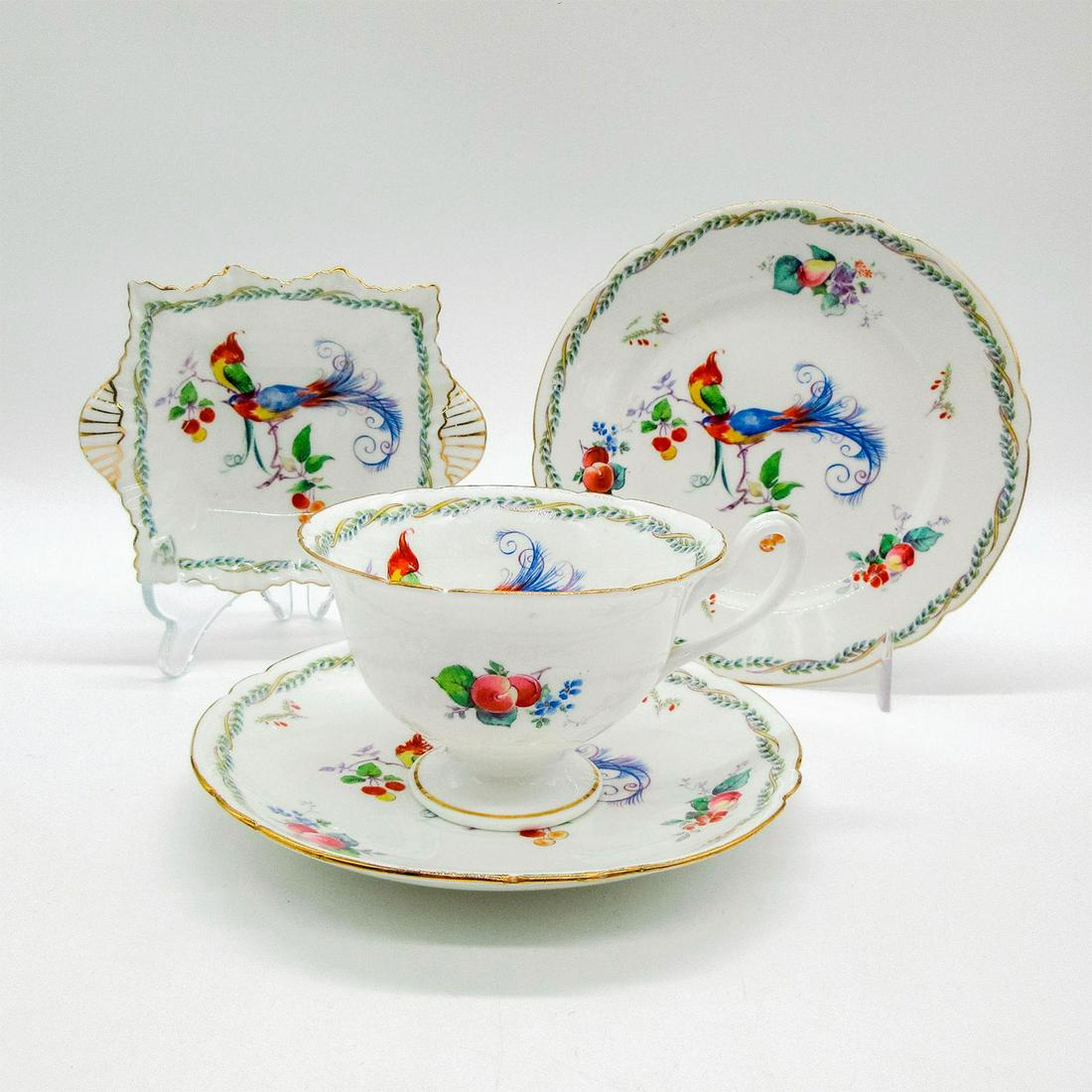 4pc Shelley England Tea Set, Versaille: Bone china tea set; Gainsborough shape. Colorful bird of paradise pattern with gilt accents. Shelley England backstamp. 11426 stamped on base. Cup size - 2.5"H x 4" diameter (widest). Saucer size - 0.