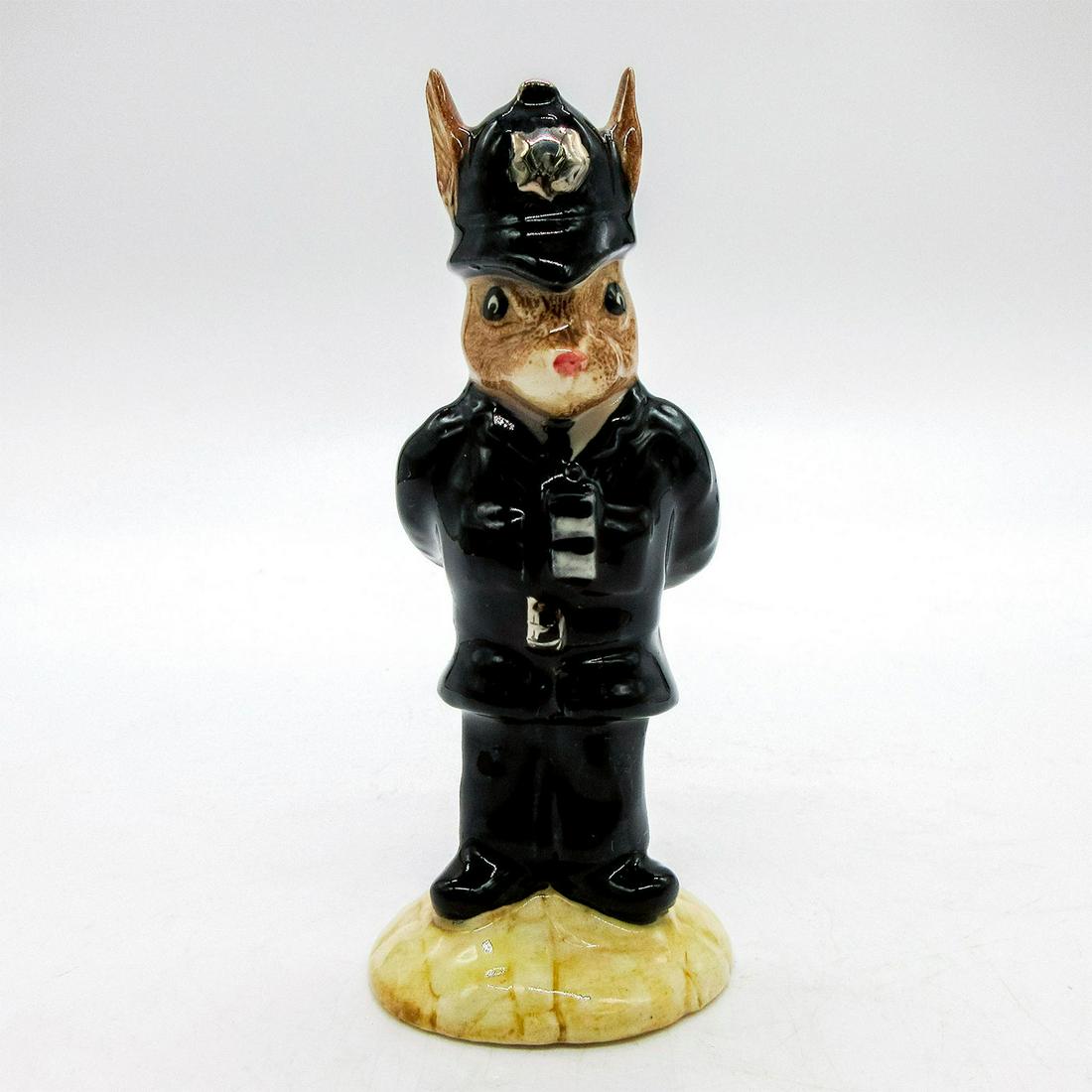 Policeman DB64 - Royal Doulton Bunnykins: Dark blue uniform. Royal Doulton backstamp. Artist: G. Tongue Issued: 1988 - 2000 Dimensions: 4.25"H Manufacturer: Royal Doulton Country of Origin: England