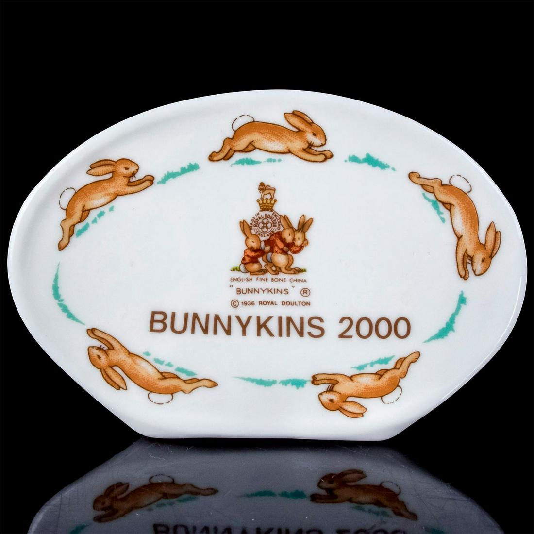 Bunnykins Millennium 200 - Royal Doulton Bunnykins Plaque: Bunnykins Millennium 200 display; glazed porcelain. Signed by Shane Ridge. Weight: 4 oz #display Issued: 2000 Dimensions: 3"H Manufacturer: Royal Doulton Country of Origin: England