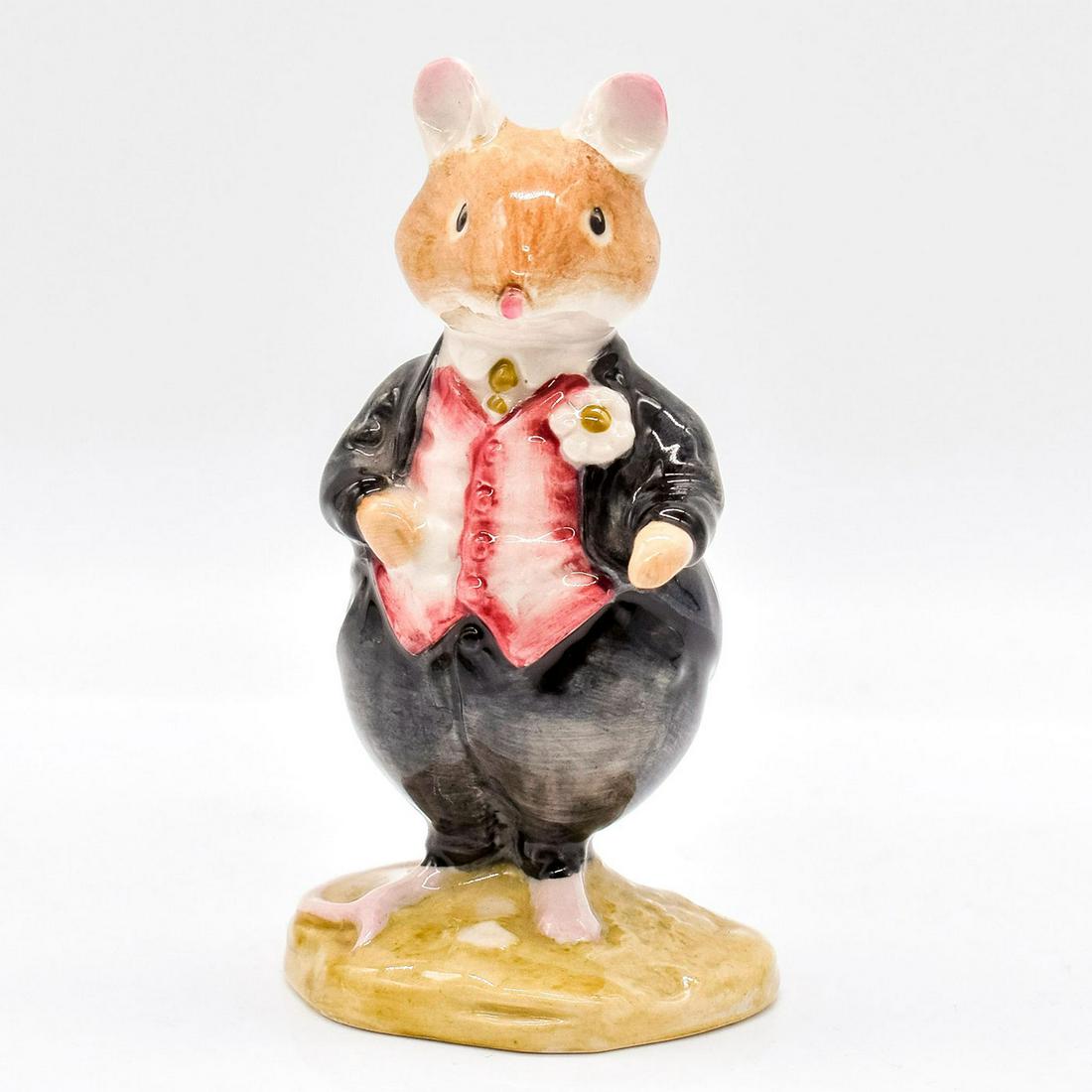 Dusty Dogwood DBH6 - Brambly Hedge Royal Doulton Figurine: Style One. Dark grey suit, rose-pink waistcoat. Royal Doulton backstamp. #royaldoulton #bramblyhedge Artist: Harry Sales, David Lyttleton Issued: 1984 - 1995 Dimensions: 3.25"H Manufacturer: Royal Dou