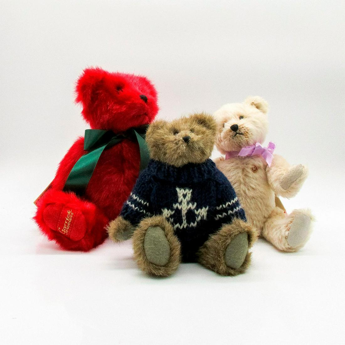 3pc Boyd's Stuffed Animals, Teddy Bears: Mohair bears with articulate arms and legs, plastic eyes, and stitched noses. Colors are blonde, ruby red, and brown. Blonde bear is a collectors edition with a lavender bow. 8"H. Ruby red bear was cr