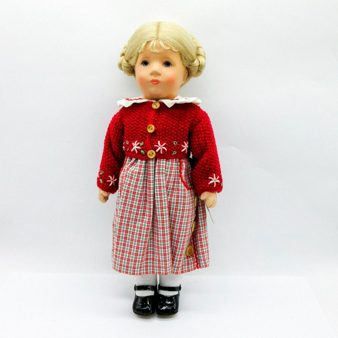 Kathe Kruse Resin Mia Doll: Charming doll modelled as a blonde girl in a hand-knit sweater over a collared dress. In original box, includes Certificate of Authenticity. Kathe Kruse was born in Breslau, which at the time was a pa