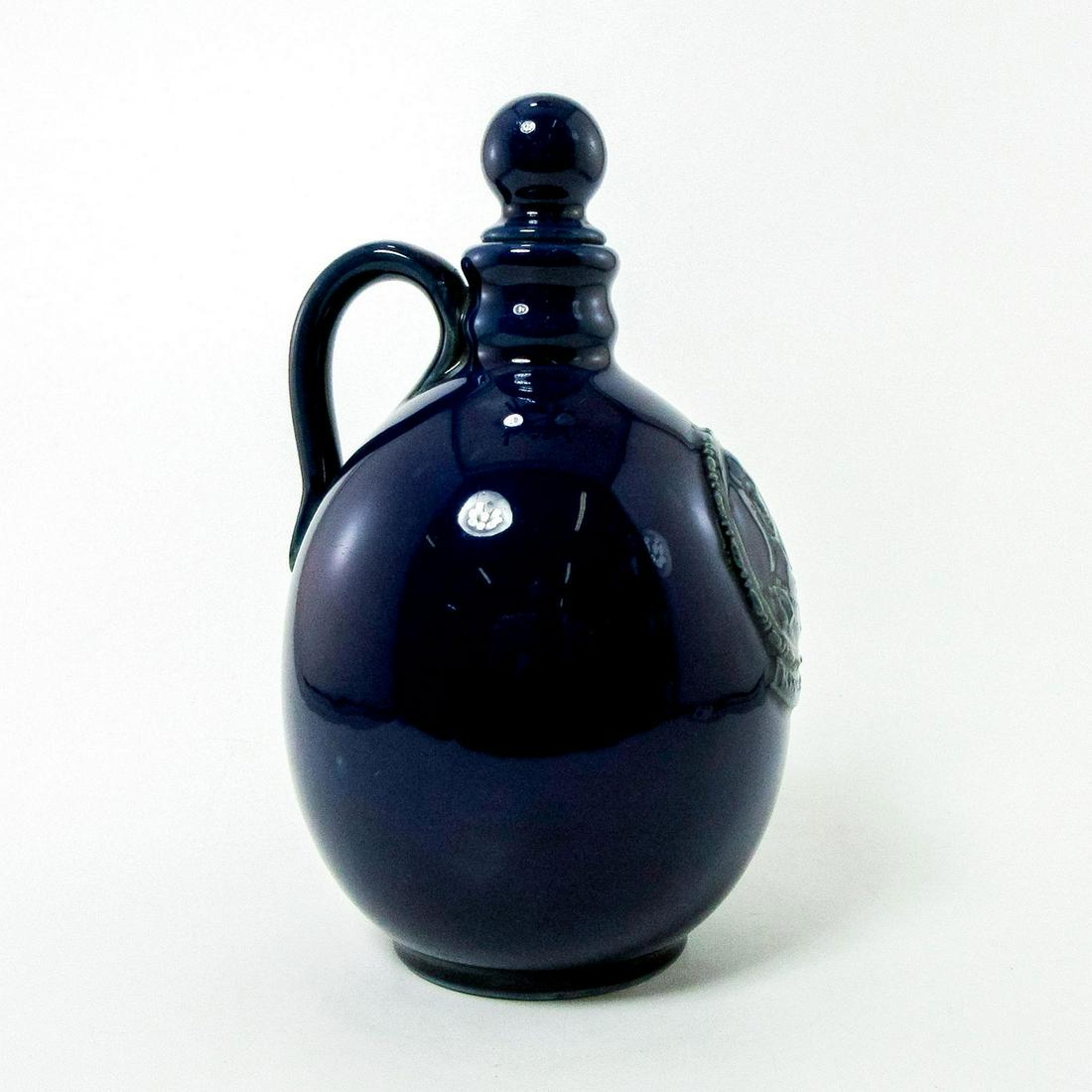 Royal Doulton Globular Flask, King George IV: Advertising ware decanter/flask in cobalt blue glaze with globular body and circular stopper.
