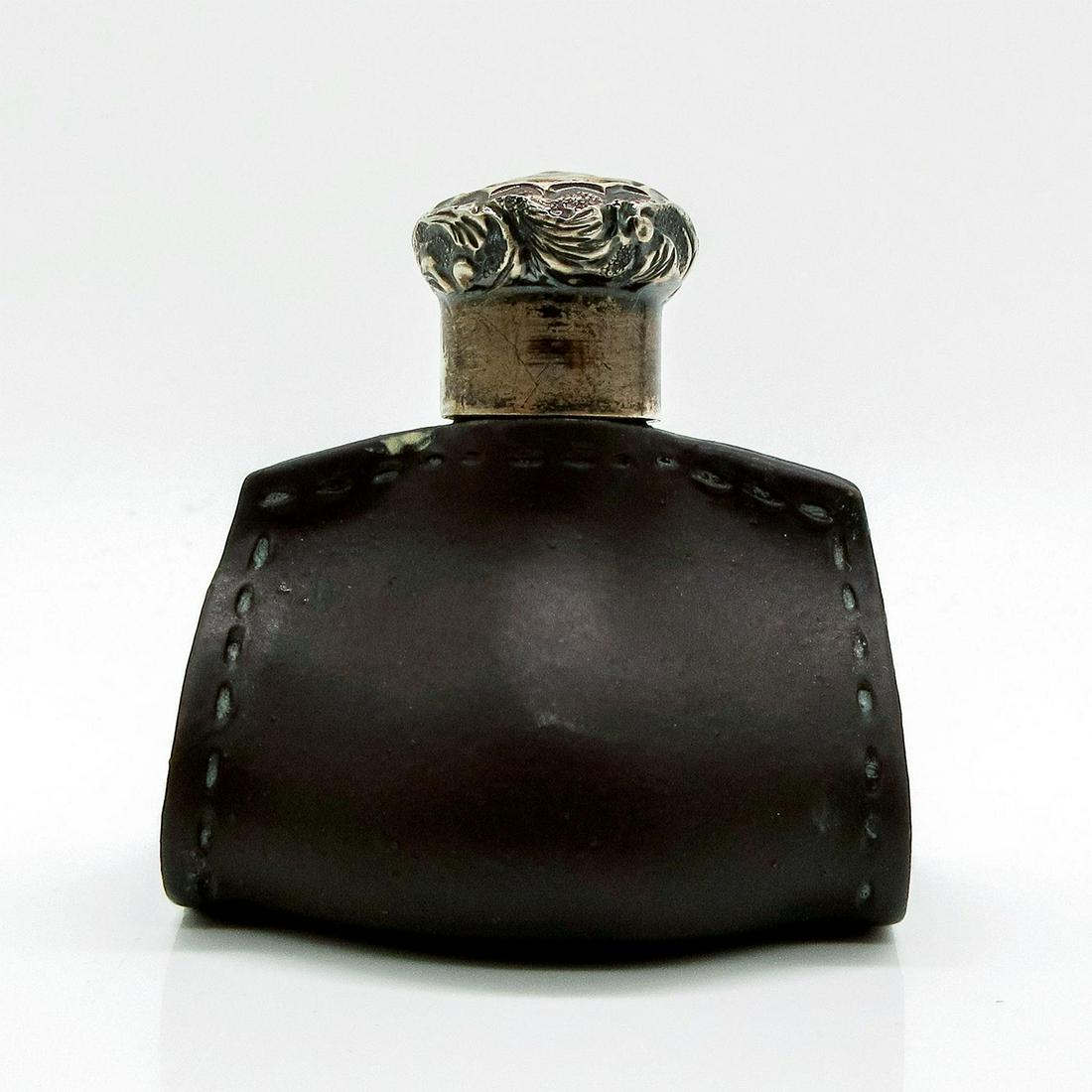 Doulton Lambeth Leather Ware, Scent Bottle: Rare miniature stoneware perfume bottle/flask; sterling silver cap with foliate decoration.