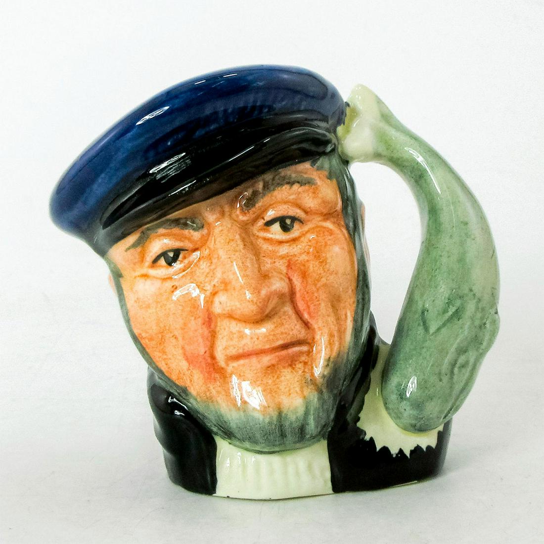 Capt Ahab D6522 - Mini - Royal Doulton Character Jug: Blue cap; black coat; white sweater.