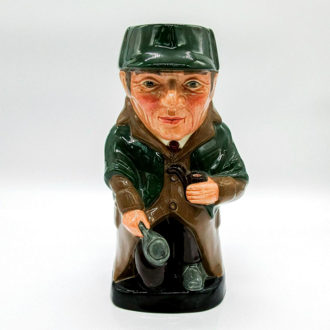 Sherlock Holmes D6661 - Royal Doulton Toby Jug: Literary Characters series. Green hat and cloak; green-brown coat. Royal Doulton backstamp.