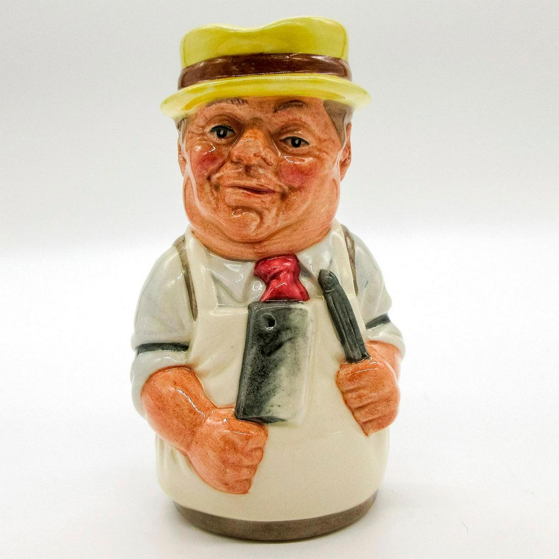 Mr. Brisket the Butcher D6743 - Royal Doulton Toby Jug: Pale blue shirt; white apron; yellow hat with brown bag.