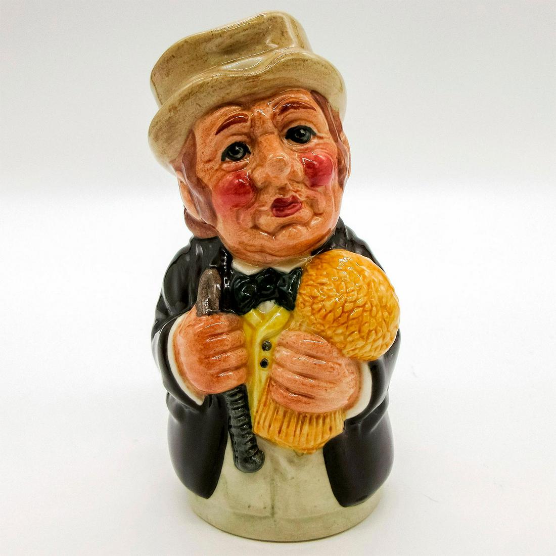 Mr. Furrow the Farmer D6701 - Royal Doulton Toby Jug: Dark brown coat; cream trousers; light brown hat.