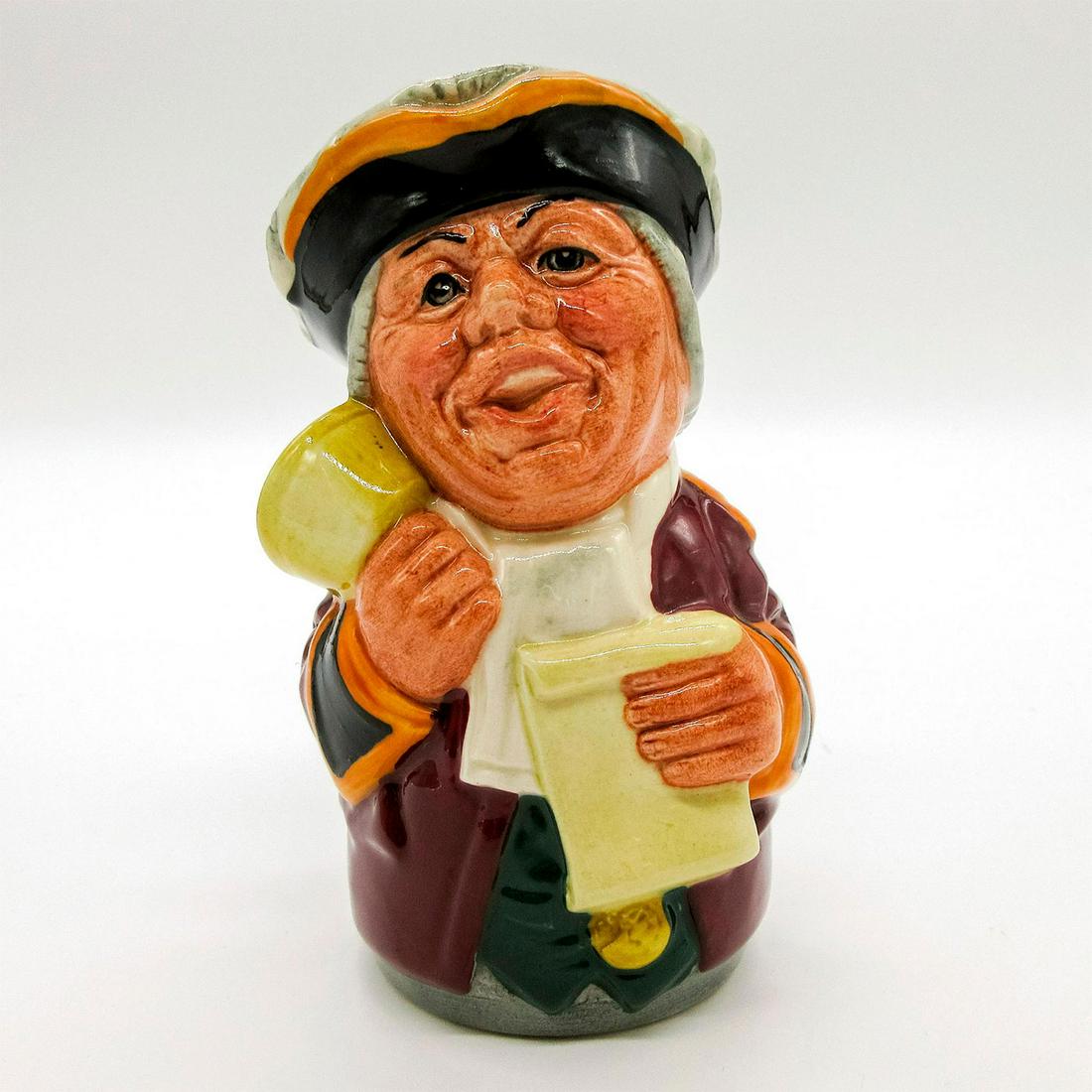 Mr. Tonsil The Town Crier D6713 - Royal Doulton Toby Jug: Burgundy coat trimmed with gold; brown hat trimmed with gold; white scarf.
