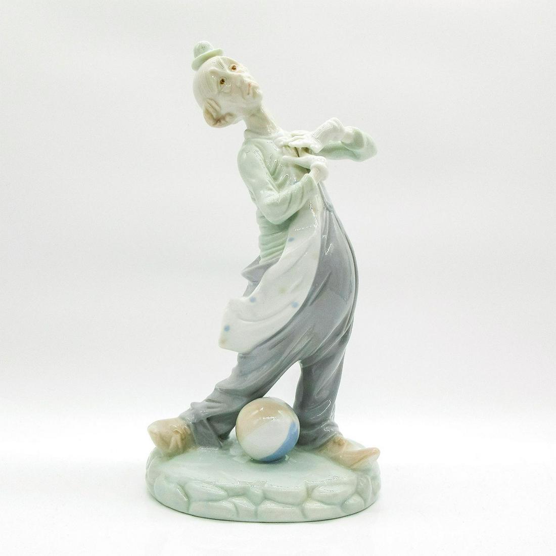 Vintage KPM Arnart Conte Figurine, Clown: Glossy figurine; a clown with sad facial expression. KPM backstamp. Impressed c. 1984 Arnart Conte. #clown #KPM Issued: 1984 Dimensions: 11"H Manufacturer: KPM Arnart Conte