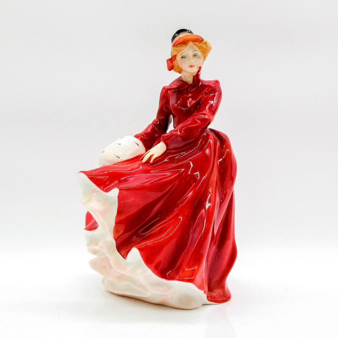 Louise HN3207 Royal Doulton Figurine: Classic Pretty Ladies series. Lady in red coat and carrying a white hand muff. Royal Doulton backstamp. #figure Artist: Amanda Hughes Issued: 1990-1996 Dimensions: 7.5"H Manufacturer: Royal Doulton Co