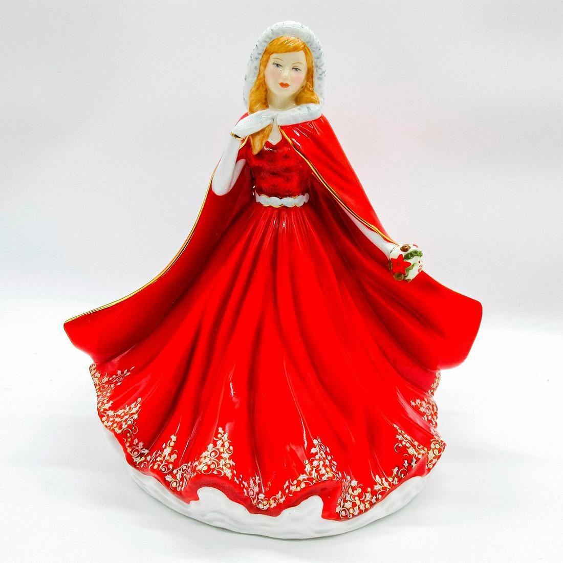 Festive Memories HN5781 - Royal Doulton Figurine: Lovely lady in a flowing red dress with cape. Gild accents on dress. Royal Doulton backstamp. Original box. #winter #festivememories #holiday Artist: Neil Faulkner Issued: 2015 Dimensions: 9.5"H Manuf