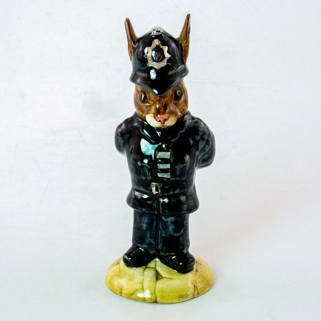 Policeman DB64 - Royal Doulton Bunnykins: Dark blue uniform. Royal Doulton backstamp. Weight: 1.8 oz Artist: G. Tongue Issued: 1988 - 2000 Dimensions: 4.25"H Manufacturer: Royal Doulton Country of Origin: England