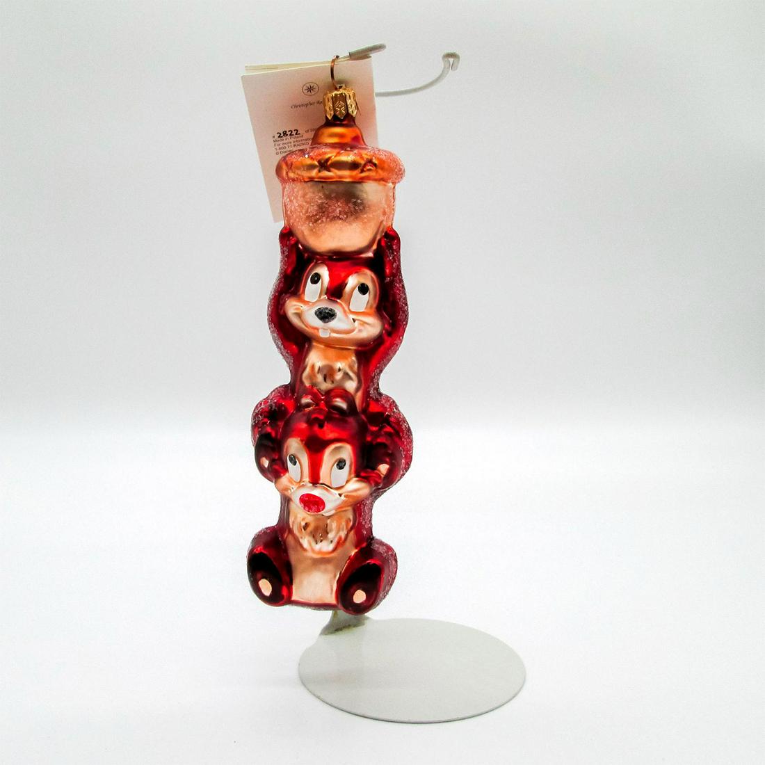 Christopher Radko Christmas Ornament, Disney's Chip n' Dale: Limited edition 2822 of 3500. Colorful hand-painted glass ornament; Disney's Chip 'n Dale with an acorn. Includes original tag. Comes with original box; size - 2.5"H x 8.75"W x 3"L. Artist: Christophe