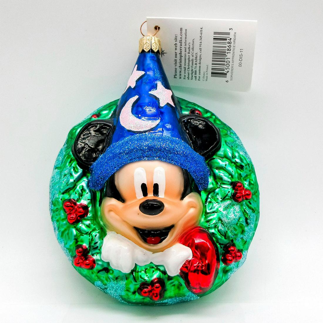 Christopher Radko Ornament, Sorcerer's Apprentice Wreath: Colorful hand-painted glass Christmas ornament; Mickey Mouse with a sorcerer's hat surrounded by wreath. 2000 on back. Disney Exclusive ornament. Includes original tag. Comes with original box; size -