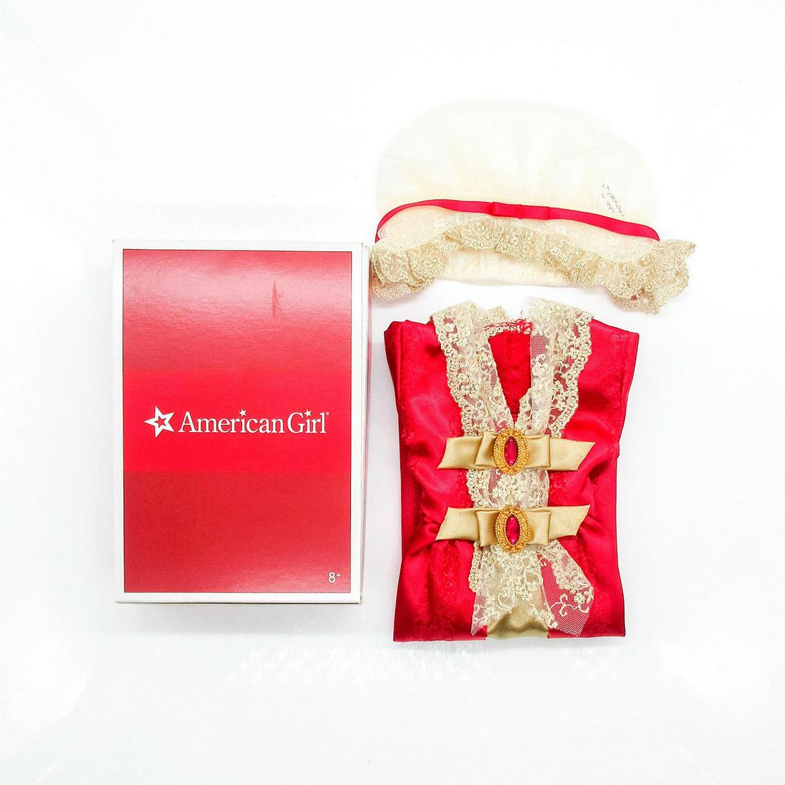 American Girl Doll Accessories, Felicity's Gala Gown and Cap: Gorgeous red and gold gala gown with lace cap. Dress has plastic ruby and gold brooches. Gold tone lace threading. Original box included. Box dimensions: 1.75"H, 5"W, 7"L. #AmericanGirl #PleasantCompa