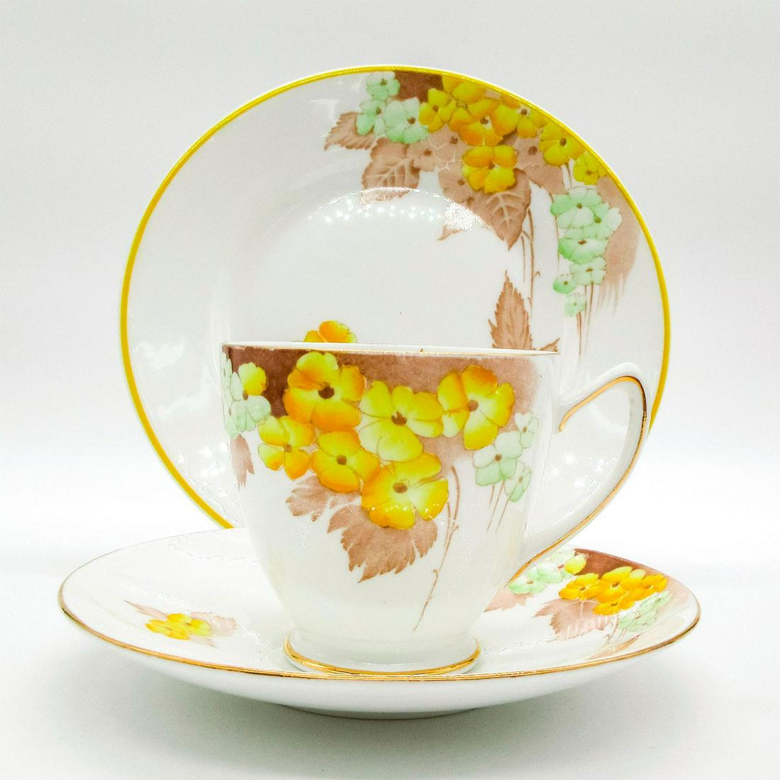 3pc Shelley England Tea Set Trio, Yellow Phlox: Vintage fine bone china tea set; Ripon shape. Yellow and green phlox flower pattern. Shelley England backstamp. Gold gilt accents on cup and saucer. Yellow rim on plate. 0172 hand-written on base. Cup