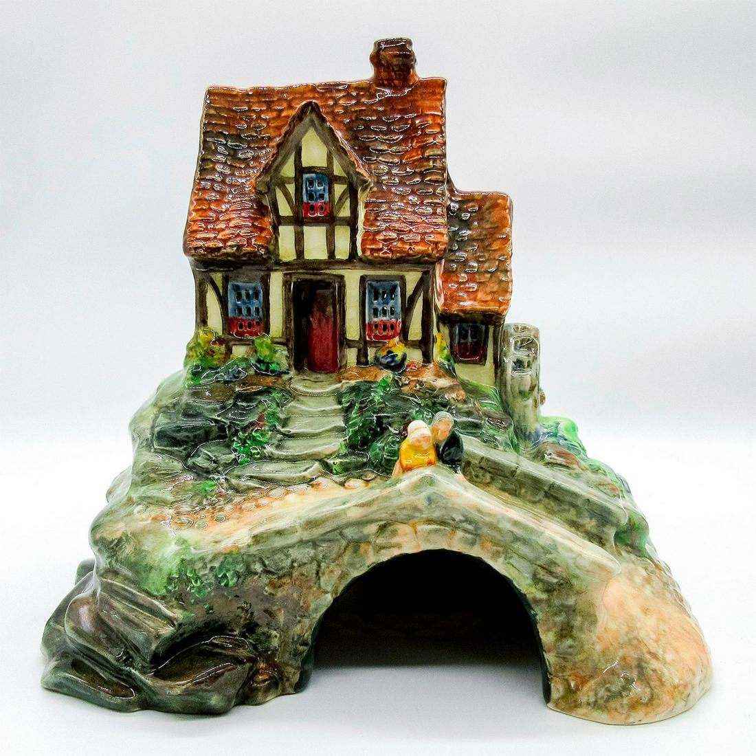 Cottage Pastille Burner - Royal Doulton Figural Sculpture: A Tudor watermill cottage with a man and woman standing on the cobbled bridge. Hand painted true to nature. Glazed. Royal Doulton backstamp. #watermill #burner #cottage #oldcouple Issued: 1928 Dimensi