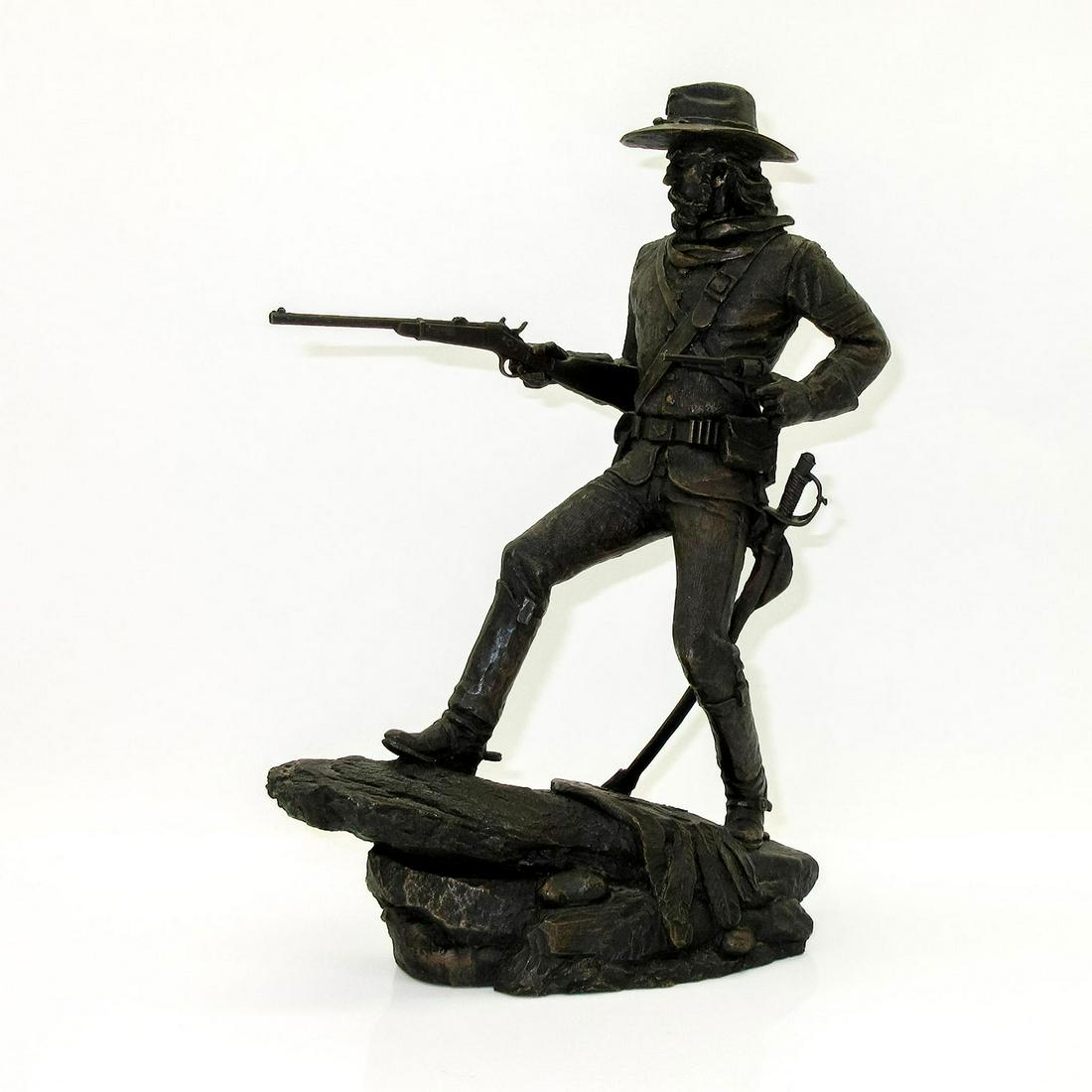 The Western Heritage Museum Bronze Resin Figure, The Cavalryman: Western Heritage Museum reproduction of The Cavalryman stands ready to defend with a rifle in the right hand and a pistol in the left hand. Jim Ponter signature plaque on the bottom. Issued: 1984 Dime