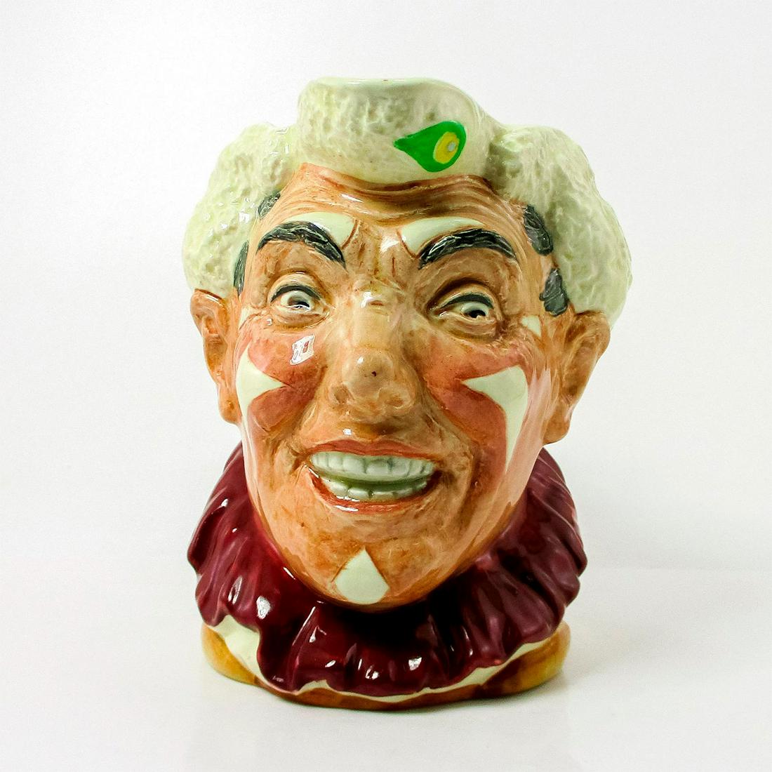 Clown D6322 with White Hair, Character Jug: Desirable early jug of the White Hair Clown. With Royal Doulton, c. 1950 Doulton & Co. Limited Artist: Harry Fenton Issued: 1950s Dimensions: 6" H Manufacturer: Royal Doulton Country of Origin: Englan