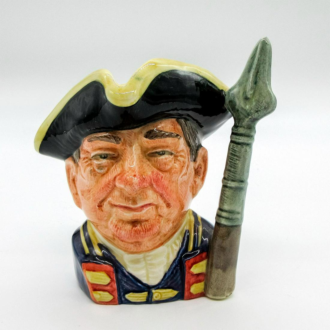 Guardsman of Williamsburg D6575 - Small - Royal Doulton Character Jug: Style One, tricorn hat with pike. Dark blue and yellow hat and jacket. Series: Characters From Williamsburg. Royal Doulton backstamp. Artist: Max Henk Issued: 1963 - 1983 Dimensions: 4.25"H Manufactur