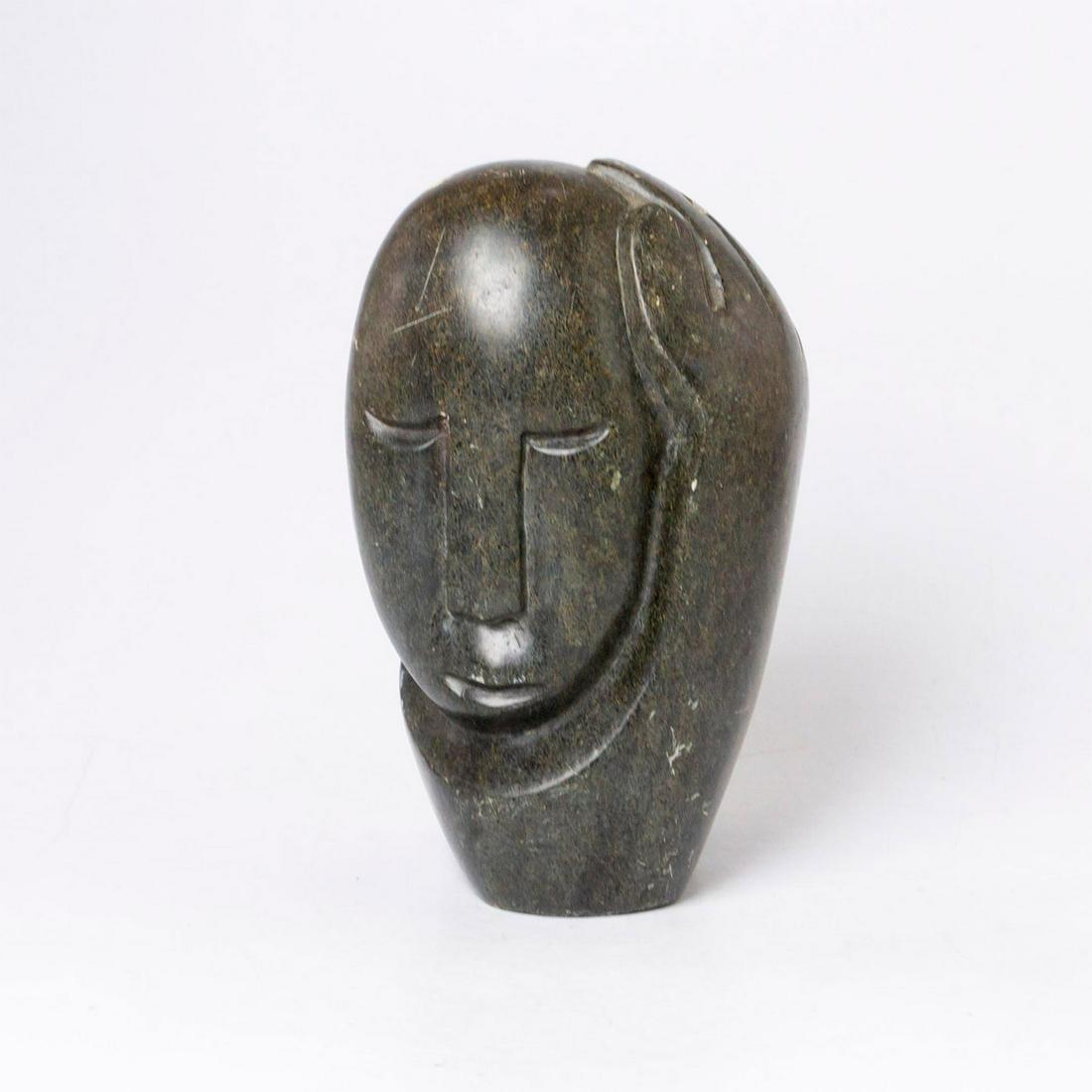 Polished Soapstone Sculpture, Stone Head: Hand carved grey stone with brown inclusions; minimalistic head and hand sculpture. No marking. #stonecarving #tribalart #sculpture Issued: 20th c. Dimensions: 3.75"W x 6"H