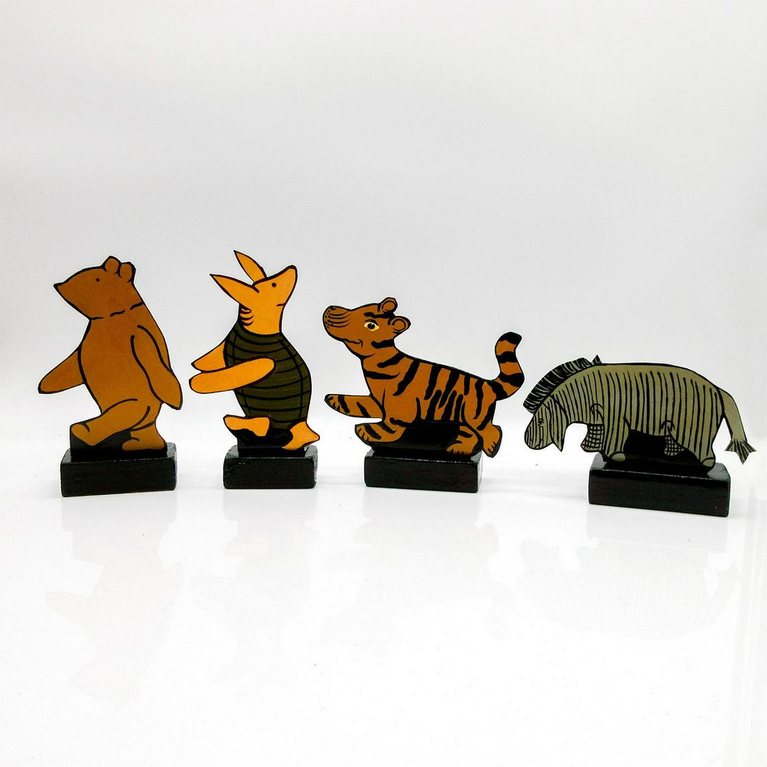 4pc Vintage American Folk Art Tin Figurines by D. Mihaltse: Four Winnie The Pooh characters, including Winnie, Piglet, Tiger and Eeyore. Artist signed and dated on the bottom. The tallest ones are 5"H, the longest is 5"L. #Cartoons #Art Artist: Diana Mihaltse 