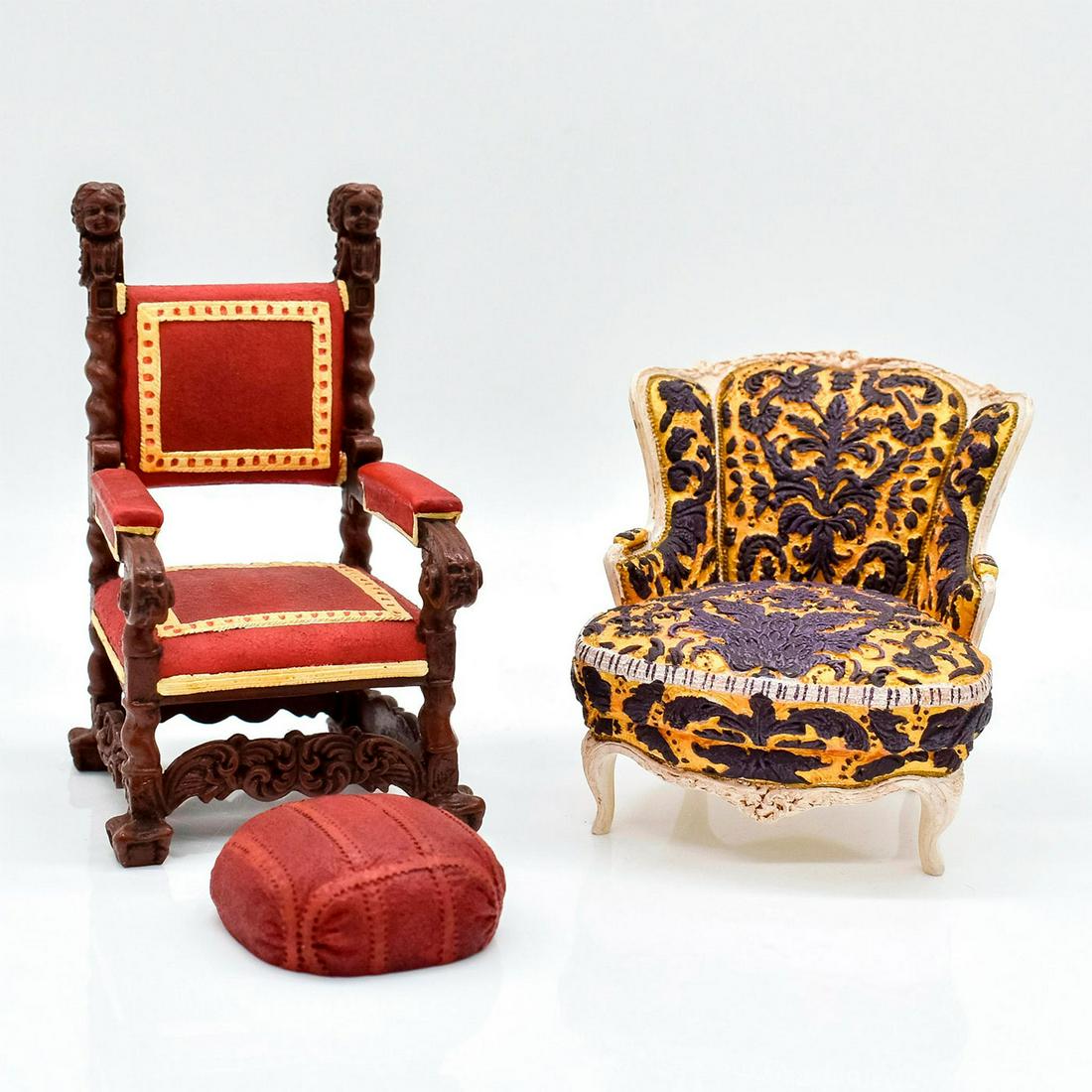 3pc Raine Mini Chairs, Take a Seat Mr. and Mrs. Vanderbilt: Pair of dollhouse chairs. Mr. Vanderbilt: red and brown with a footstool. Mrs. Vanderbilt: purple and gold pattern. Original Raine stickers to base. Mr. Vanderbilt: 3.5"h. Mrs. Vanderbilt: 2.5"H. #rai