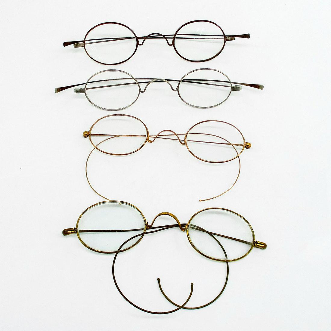 4pc Antique Prescription Spectacles: Four pairs of spectacles of various prescriptions and metals. Two loop temple and two straight temple. Issued: 19th c. Dimensions: 4.75"L x 5"W x 1.25"H