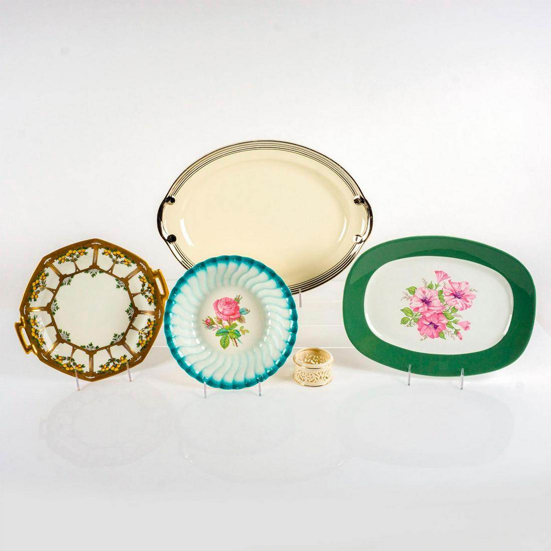 5PC American Decorative Dishes + Tea Candle Holder: An assortment of 3 serving platters, 1 bowl, and a floral cut out porcelain tea candle holder. Tea holder: Lennox, 1.75"D x 2"H. Bowl: Homer Laughlin, 9"D. Lemon platter: W.A. Pikard, 11"L x 9.75"W. F