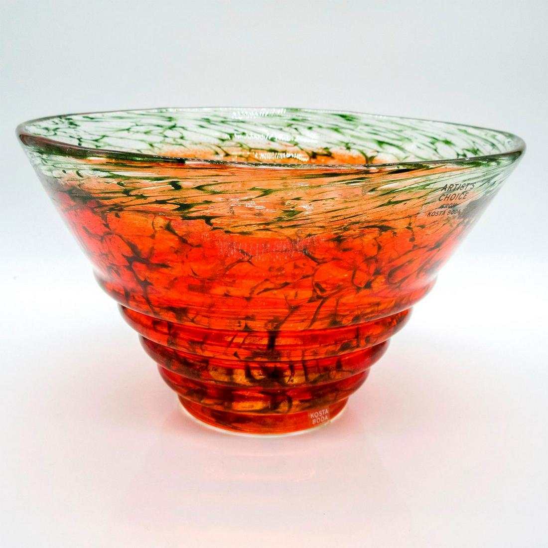 Kosta Boda Kjell Engman Art Glass Bowl: Kjell Engman collection; mouth blown glass. Vibrant orange body with green caustic accents throughout. Kosta Boda, K. Engman 7050645 etched on base. Artist: Kjell Engman Issued: c. 20th - 21st c. Dime