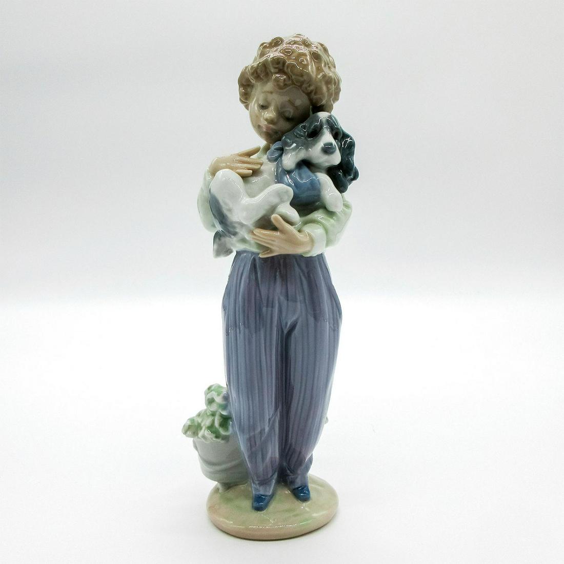 My Buddy 1007609 - Lladro Porcelain Figurine: Glossy finish; Lladro backstamp. Lladro Collectors Society 1989 Edition. Artist: Antonio Ramos Issued: 1989-1989 Dimensions: 8.75"H x 3.25"W Manufacturer: Lladro Country of Origin: Spain