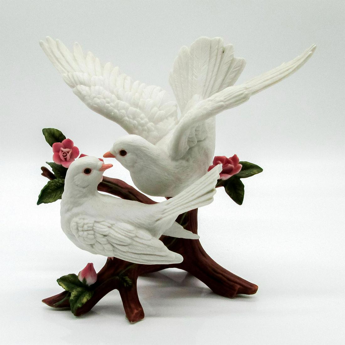 Lenox Wedding Promises Collection Cake Topper, Dove: Matte finish. In white, brown, pink, and green coloration. Fine porcelain. Lenox backstamp. Comes with original box. Dimensions of box: 10.5"L x 9.5"W x 7.5"H.#Lenox Issued: circa 20th c. - 21st c. Di