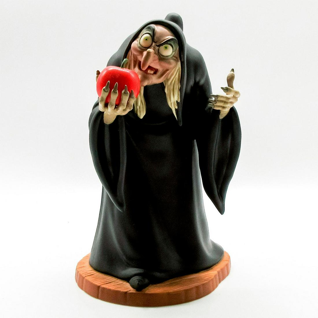 Witch Snow White Character - Walt Disney Classics Figurine: From Disney Classics Collection Snow White and the Seven Dwarfs. Titled Take The Apple, Dearie. Matte finish porcelain. Walt Disney backstamp. Comes with original box and certificate. Box measures 9.5