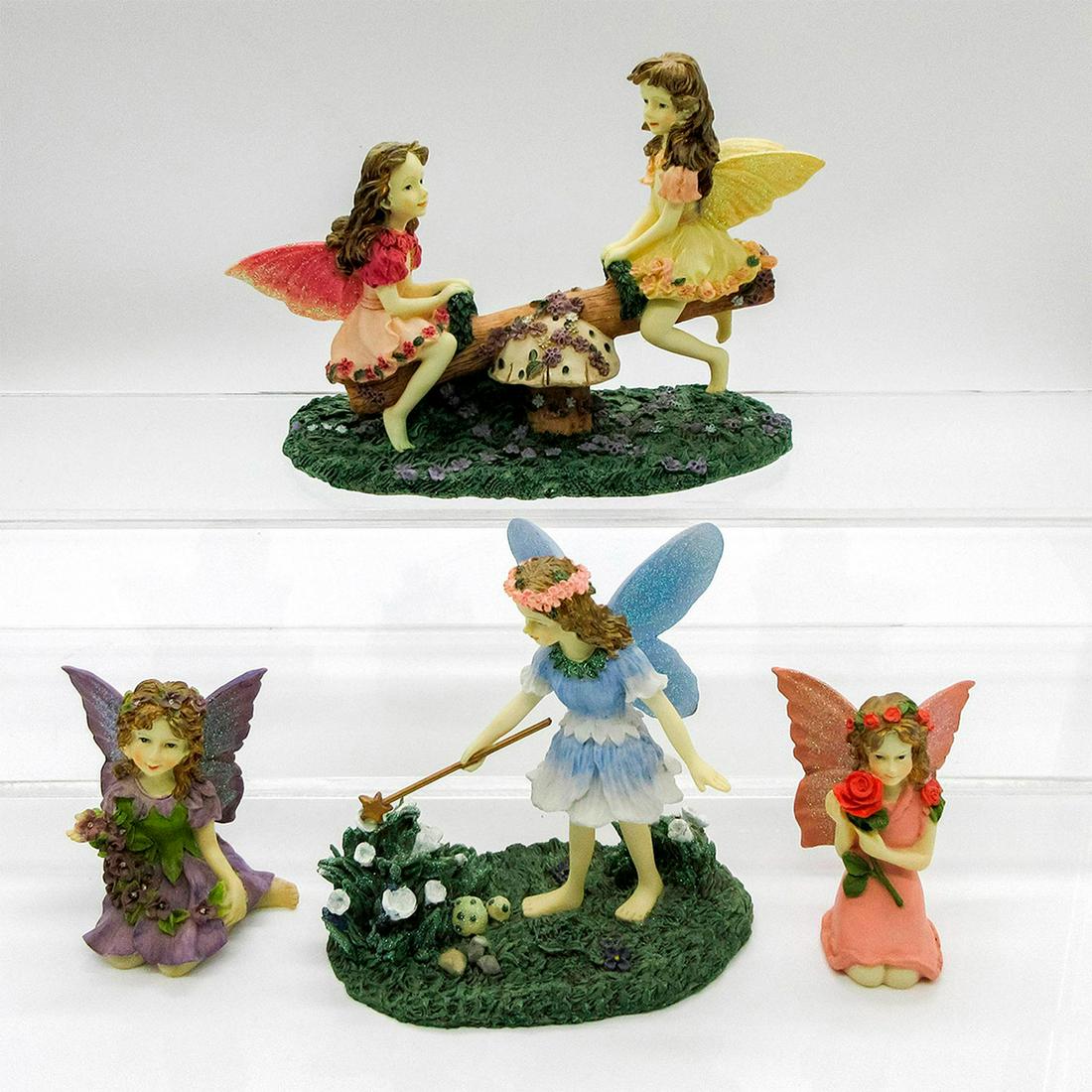 4pc Dezine Fairy Figurines: Part of the Fairy Collection. Includes: "Garland Fairy" 5577 (Limited Edition nr 32028 3"H), "The Fragrant Fairy" 5576 (Limited Edition nr 17134, 3"H), "A Magic Wand" 5