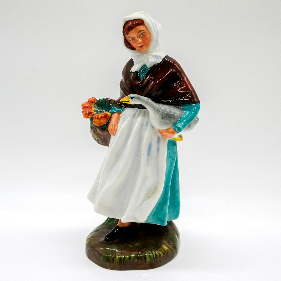 Country Lass HN1991A - Royal Doulton Figurine: Part of the Farm & Country collection. Royal Doulton backstamp. Artist: Leslie Harradine Issued: 1975 - 1981 Dimensions: 7.25"H Manufacturer: Royal Doulton Country of Origin: England