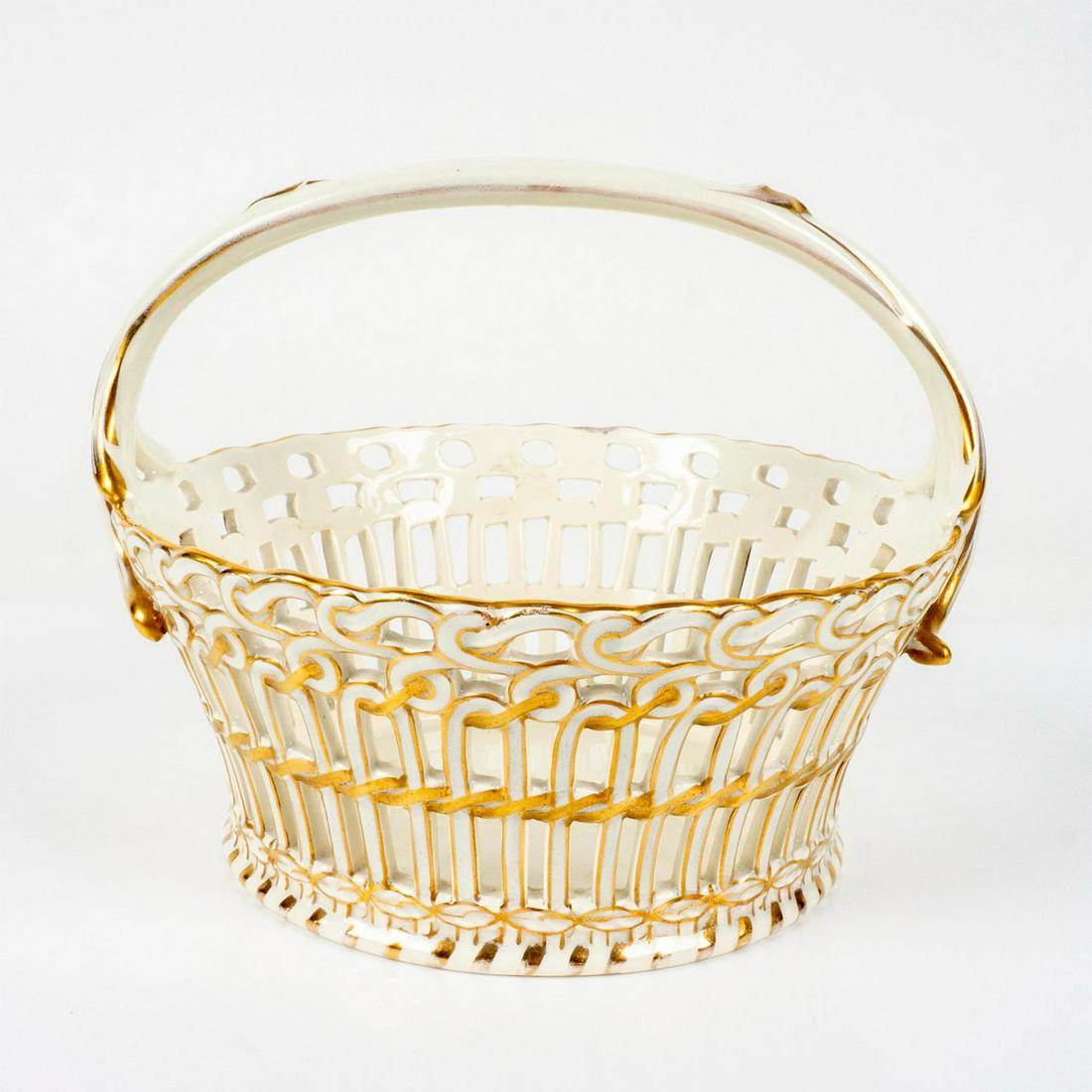 Antique Keller and Guerin Luneville French Porcelain Basket: Old Strausbourg French faience. Cream color body with gilded accents. K.G. Luneville France mark. This lot has no reserve. Dimensions: 6" H x 7.25" Diameter Manufacturer: Keller and Guerin Country of 