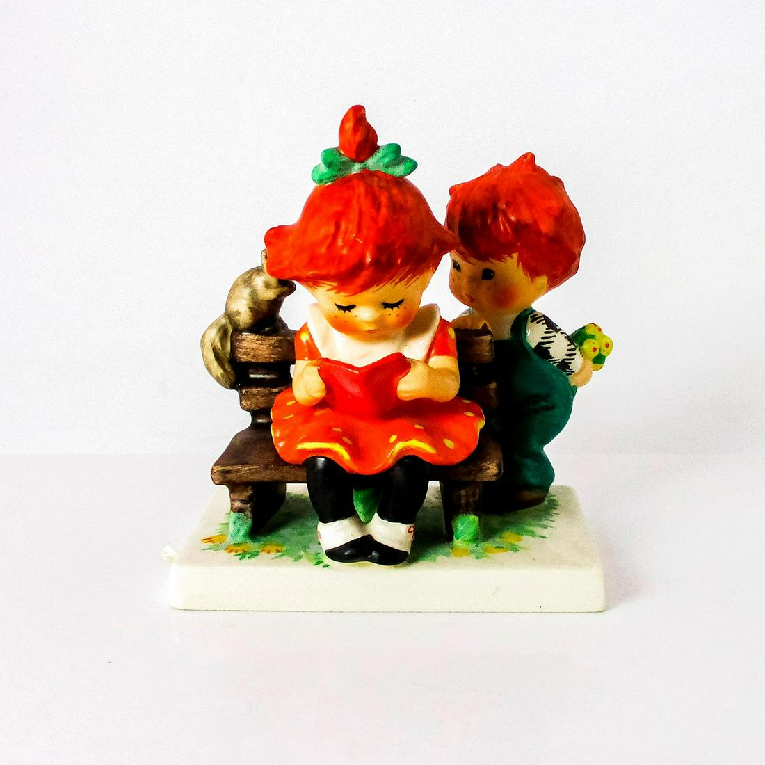 Goebel Figurine, A Young Man's Fancy Byj 6: Matte and glossy finish. Goebel backstamp. #Goebel Issued: 20th c. Dimensions: 4.75" H Manufacturer: Goebel Country of Origin: Germany