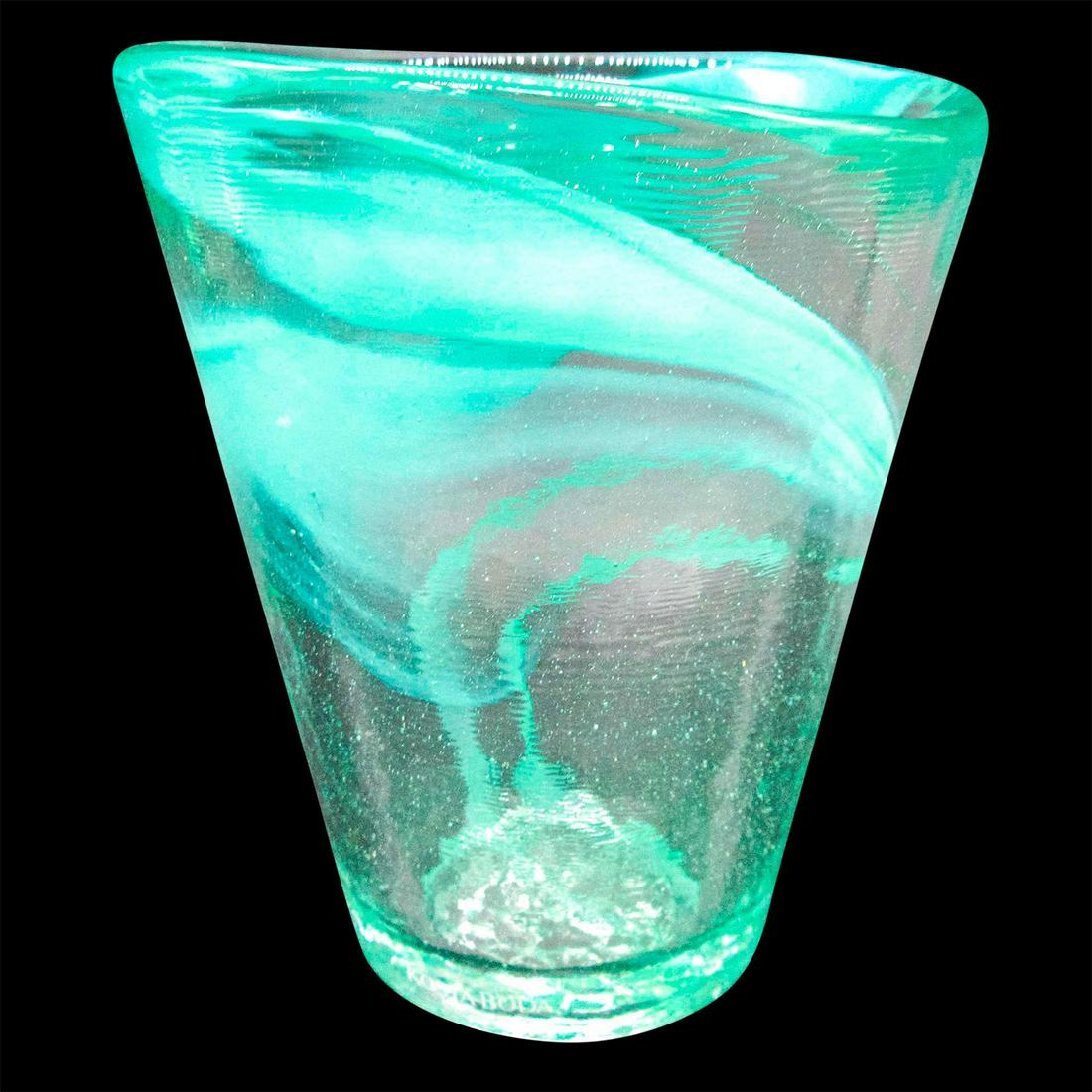 Kosta Boda Cup, Mine! Lime: Thick glass multipurpose cup with lime green swirl design. Exterior has a lightly hammered texture. From the Mine! collection. Artist fish insignia stamped to base. Original box included. Box dimensio